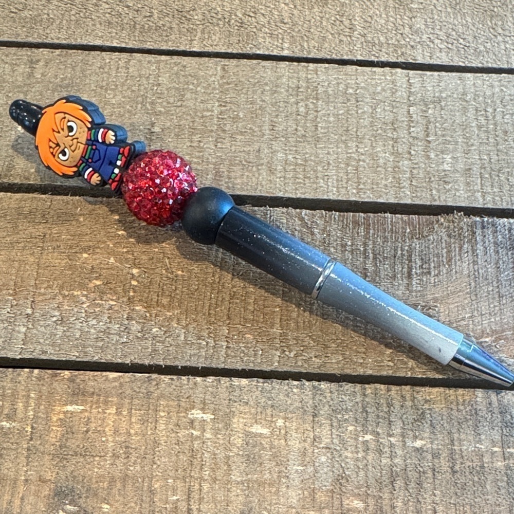 Character Pen with Red Glitter Accent